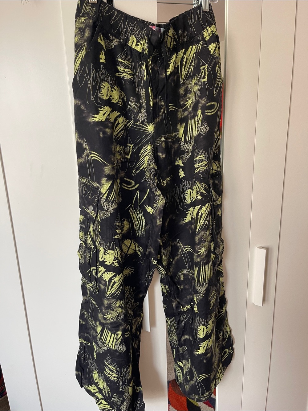 Urban Outfitters Black Cargo Pants with Lime Brushstroke Print